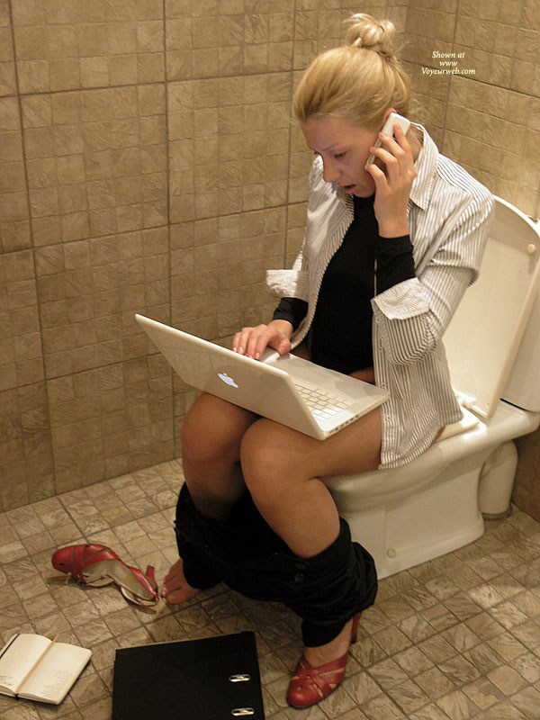 Using Laptop On Toilet , Red Business Pumps, Black Pants, Multitasking, Multitasking Woman On Toilet, Telecommuting Toilet Shot, Striped Button Down Shirt Black Undershirt, Macbook, Black And White Office Apparel, Ibook, Sitting On Toilet