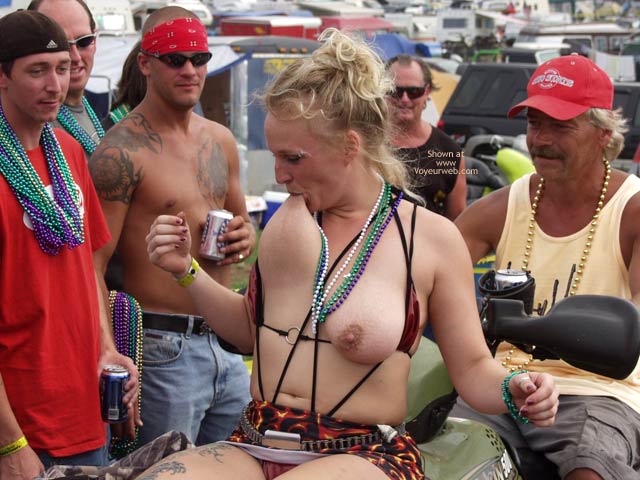Pic #1Biker Rodeo Chick Swallows Her Nipples!