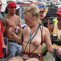 Pic #1 Biker Rodeo Chick Swallows Her Nipples!