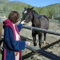 Pic #1Marie Topless And Feeding A Horse
