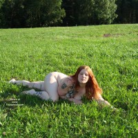 Pic #1 Sexy Redhead Posing Outdoor 2