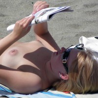 Pierced Nipple Voyeured At Topless Beach - Sunglasses, Topless Beach, Topless, Beach Tits, Beach Voyeur , Pierced Nipple, Puffy Aerola, Blond, Reclining At Beach