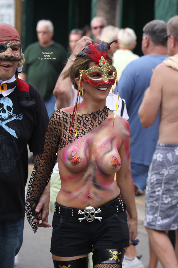 Topless In Public Wearing Body Paint - Brunette Hair, Large Breasts, Topless , Pirates Mate, Pained Tits, Pen Mouth, White Teeth, Festival Voyeur, Nice Smile, Topless With Body Paint, Short Brunette Hair
