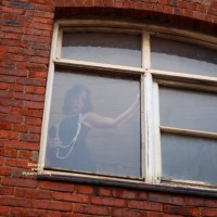 Brazen Window Girl