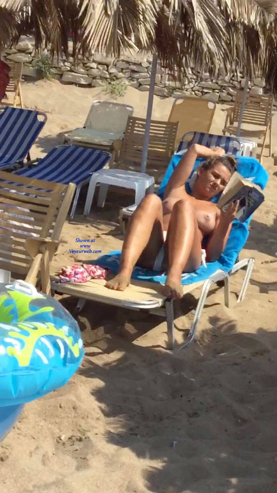 Pic #1Busty Topless Girl On Greek Beach - Topless Girls, Outdoors, Beach Voyeur