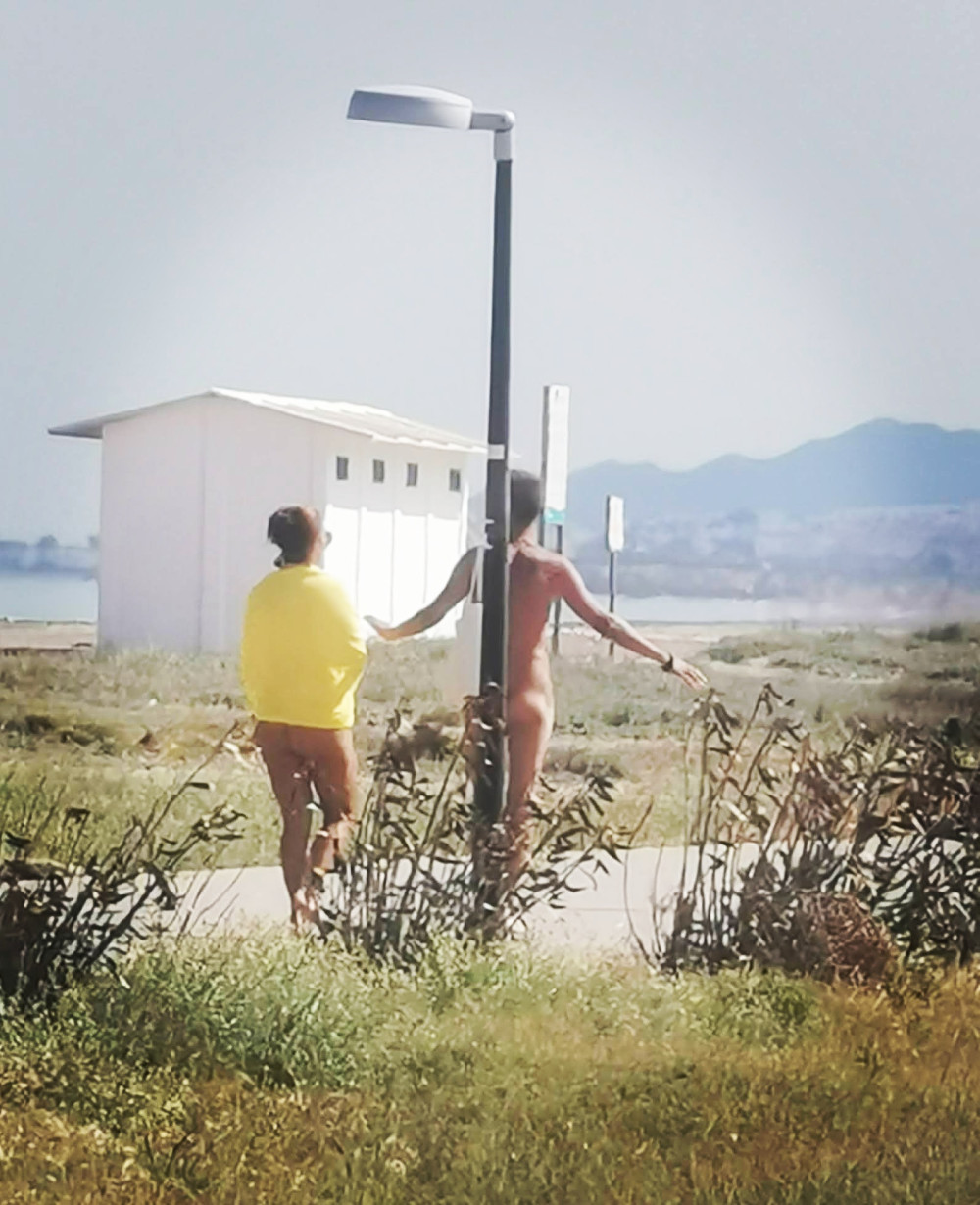 Pic #1 A walk along the nude beach.