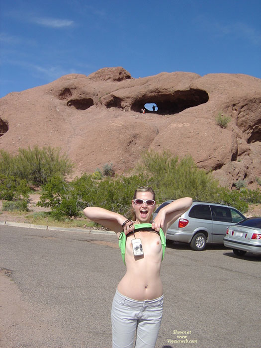 Girl Flashing In A Parking Lot - Flashing, Small Breasts, Sunglasses , Cute Small Breasts, Curvy Hips, Flash Outdoors, Green Tank Top Pulled Up, Pink Sunglasses, Arizona Tourist Flashing, Flashing Tits