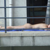 Neighbour Voyeured - Brunette Hair, Nude Amateur , Slim Young Brunette Sunbathing On Belly, Naked On Balcony, Nip, Nude Sunbathing, Lying Down Sunbathing On Balcony