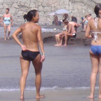 Topless Girls Walking On The Beach