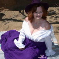 Buxomgirl38e in a purple corset!