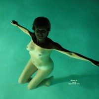 Naked Swimming - Tan Lines, Naked Girl, Nude Amateur , Arms Stretched Out To Sides, Lighted Pool, Floating Tits, Skinny Dipping, Underwater Delight, Underwater Nude Ballet Dancing, In A Green Pool, Awesome Swimming Pool Pose