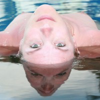 Cool Reflection With Erect Nipples - Looking At The Camera , Looking Directly To Camera, Bent Over Backwards, Laying Back In Water Looking Over Head With Eyes Locked On Camera, Green Eyes, Mirror Image, Nipples Pointing Toward The Sky, Water Reflection, Reflection In Water